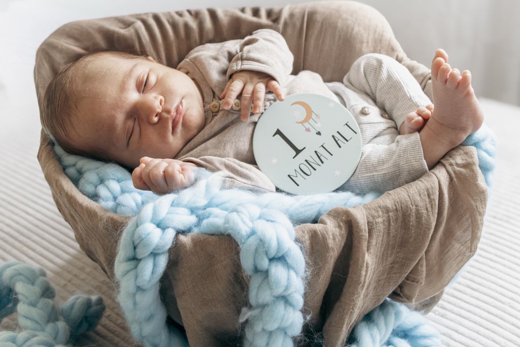 Newbornshooting Baby im Korb